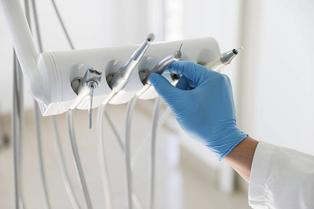 Professional Invisalign Clear Aligners technician working in St. Joseph, IL
